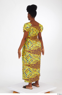 Dina Moses dressed standing whole body yellow long decora apparel…